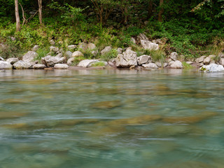 mountain river at sunset in the mountains of italy