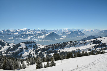 Fototapeta na wymiar Beautiful view on snowy Swiss Alps from top of Mount Rigi in canton of Schwyz in Switzerland