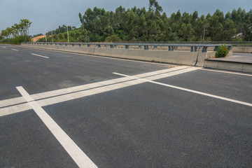 Urban viaduct pavement and concrete guardrail landscape