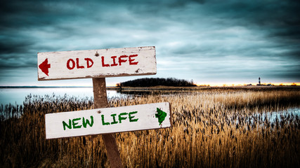 Street Sign to NEW LIFE versus OLD LIFE - obrazy, fototapety, plakaty