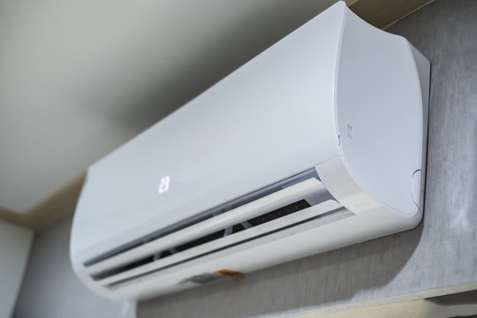 Inverter Air conditioner install on modern grey wall