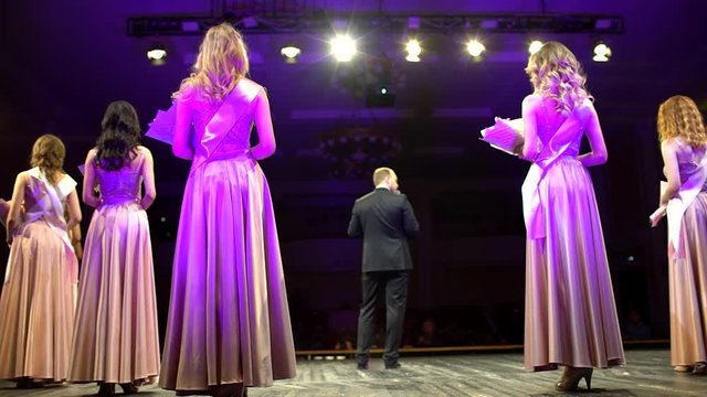 winner of beauty contest. model posing on stage, fashion show podium. Crowning Moment as Winner for International world. Miss Beauty Contest. Award ceremony victory win celebration, crown, finalist