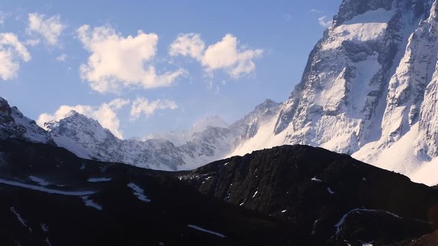 Time Lapse of Snowy Andes with crazy clouds, Chile