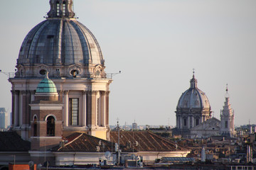 Naklejka premium View of the rooftops of Rome at sunset
