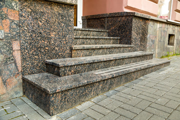 Detail of a house facade. New granite stairs.