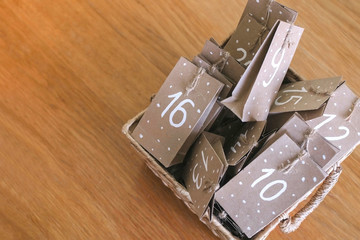 Christmas advent calendar in a wicker basket