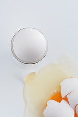 broken egg on a white background