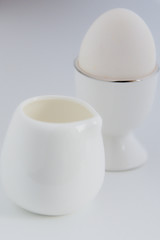 egg on a white stand