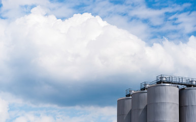 steel tanks on sky background