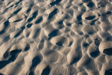 Hintergrund mit Muster - Kleine Sanddünen auf Strand 