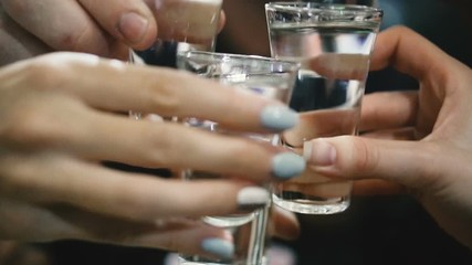 Alcohol. Glasses with alcohol. People drink alcohol.