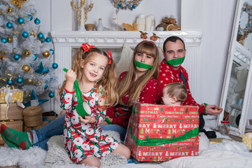 Merry Christmas and Happy Holidays! Xmas Christmas photo of surprised happy family. daughter...