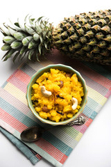 Pineapple sheera or Halwa also known as Ananas keshri shira. Popular South Indian Dessert recipe. selective focus