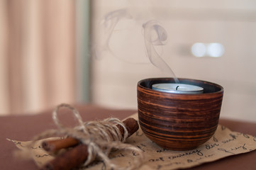 cup of tea and cookies on wooden table