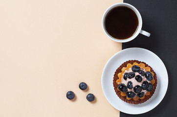 Cheesecake with blueberries and coffee
