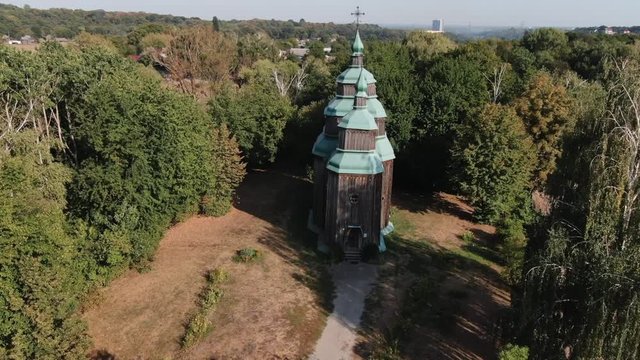 aerial view old wooden church  in open air museum of flork architecture  pirogovo traditional village  Ukraine Kiev HD video
