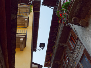 old wooden door on the wall of an italian house
