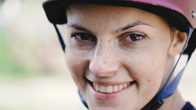 Wakeboarding helmet. Woman in a helmet for wakeboarding.
