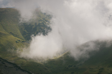 Fototapeta premium Hiking in the Low Tatra mountains in Slovakia, almost alone on the ridgeway, only majestic mountains