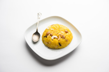 Pineapple sheera or Halwa also known as Ananas keshri shira. Popular South Indian Dessert recipe. selective focus