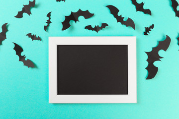 Halloween paper decorations on pastel blue  background. Halloween concept. Flat lay, top view, copy space - Image