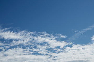 white fluffy cloud in the blue sky