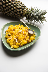 Pineapple sheera or Halwa also known as Ananas keshri shira. Popular South Indian Dessert recipe. selective focus