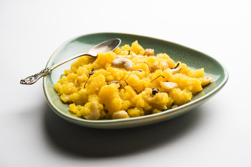 Pineapple sheera or Halwa also known as Ananas keshri shira. Popular South Indian Dessert recipe. selective focus
