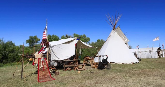 Rocky Mountain Man Rendezvous primitive camp. 19th century fur trading outpost. Oregon, California and Mormon Trails. Pioneer, wilderness attire, camping and  old trapper skills.