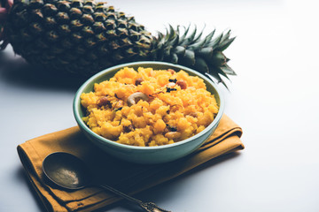 Pineapple sheera or Halwa also known as Ananas keshri shira. Popular South Indian Dessert recipe. selective focus