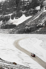 Truck in mid-glacier at the Columbia Ice Field, Canada