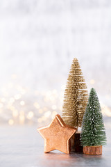 Christmas tree on silver, bokeh background.
