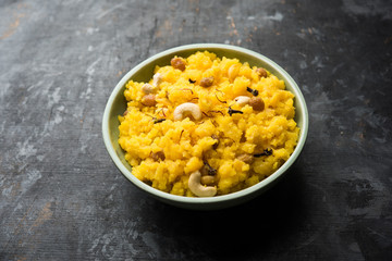 Pineapple sheera or Halwa also known as Ananas keshri shira. Popular South Indian Dessert recipe. selective focus