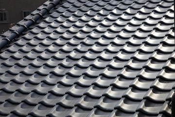 silhouette of roof tile home building for background.