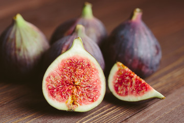 fresh fig fruits on dark wooden background