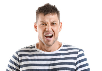 Portrait of angry man on white background