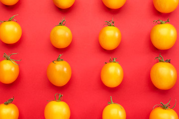 Fresh tomatoes on color background