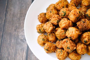 Chinese food croquettes，Wooden table top background