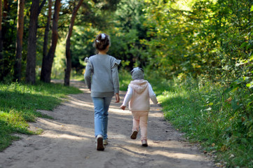 Fototapeta premium girls walking in the park