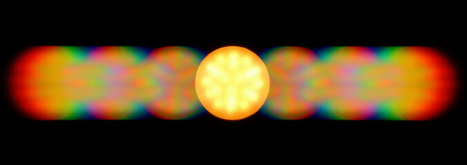 Photo of the diffraction pattern of LED lamp light, comprising a large number of diffraction orders obtained by the phase grating