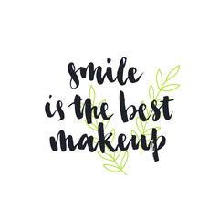 Smile is the best makeup. Inspirational quote handwritten with black ink and brush, custom lettering for posters, t-shirts and cards. Vector calligraphy isolated on white background