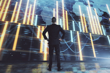 Obraz premium Businessman and forex graph and world map hologram. Double exposure. Concept of financial education and analysis