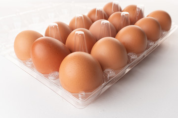 Close up shot fresh chicken eggs isolated on white