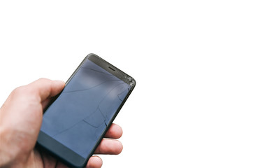 Man is holding broken smartphone isolated on white background.