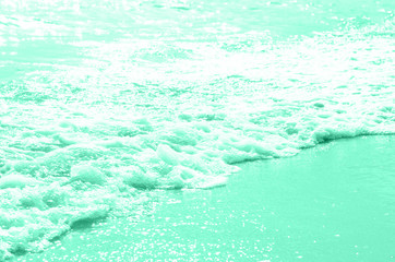 Closeup sea wave in mint color.