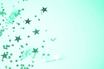 The background is mint with lots of silver stars and curlicues.