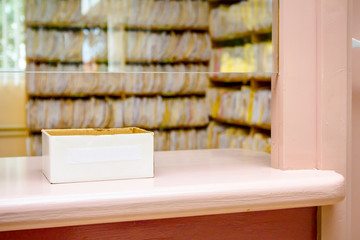 Cardboard box for check-in at medical archive