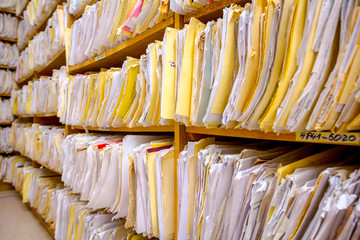 Medical files with patient information in doctor's office,