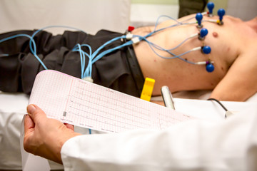 Doctor is analyzing patient's cardiogram test. Diagnostic, healthcare, medical service