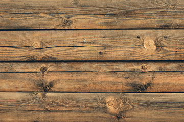 Fototapeta premium Old wood planks background. Brown wooden striped texture. Vintage wall surface, pattern. Weathered hardwood, antique fence, oak boards. Plank - timber.